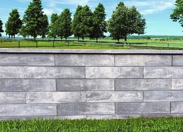 Das langgestreckte Steinformat verleiht der neuen Jasto Elegantline-Mauer ihr charakteristisches Erscheinungsbild. Farbvariante: anthrazit-wei-nuanciert. 