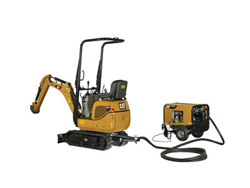 Luft mit Diesel oder mit Strom aus der Steckdose: Mikrobagger Cat 300.9 VPS mit beigestelltem Hydraulikaggregat.