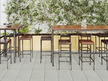 Die neuen VELVEL CONCRETE-Terrassenplatten in der Trendfarbe Copper-Green.